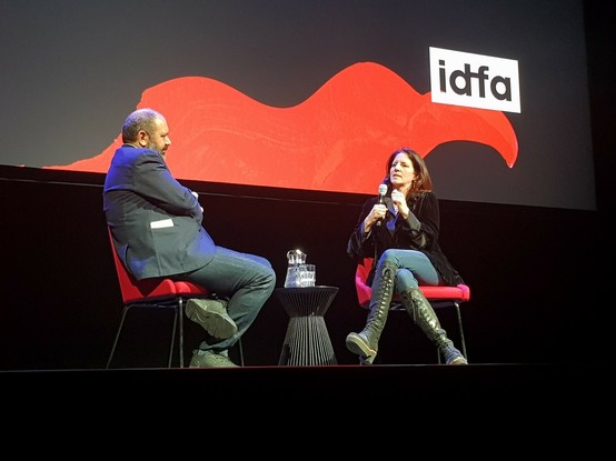 Laura Poitras getting interviewed by Orwa  Nyrabia at the #idfa2022