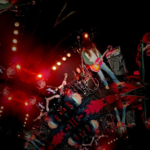 A psychedelic mirror image of Blasting Rod performing at Huck Finn night club in Nagoya, Japan.