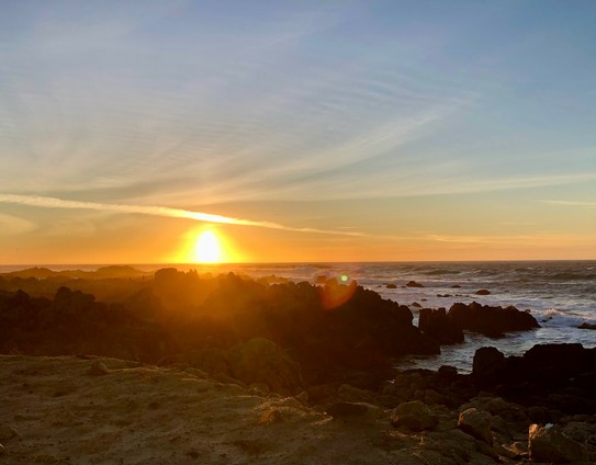 Photo of the sun setting over Monterey bay, taken from Pacific Grove.