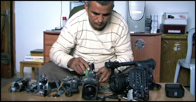 Emad Burnat in 2012 documentary 5 Broken Cameras