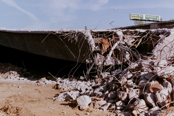 A tangle of metal rods and concrete rubble at a bridge collapse in the aftermath of the January 17, 1994 Northridge earthquake
