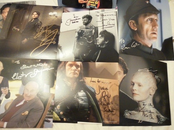 Autographed promo pics of 6-7 actors who were at London Film & Comic Con in July 2015. Dedications blurred to obscure my name. Reeve Carney as Dorian Gray from Penny Dreadful top left, then a black & white behind the scenes one of Jeremy "Boba Fett" Bulloch and Dave "Darth Vader" Prowse relaxing with their helmets off. Top right is Ken "Admiral Piett" Colley.

Bottom row has Christopher Benjamin as his later new Doctor Who character and Julian "General Veers" Glover from his 'Count Scarlioni' Doctor Who appearance in kind. Rightmost is an Alice Krige signed photo of her as the Borg Queen next to Data, whose face is obscured here.

Scifi-royalty.

Fett wished me "Be cool" and Vader "The Force is with us".