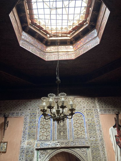 A picture showing one of the living spaces - 16th C Arabic style… like an Arabic palace… chandeliers & a very high decorated ornate skylight