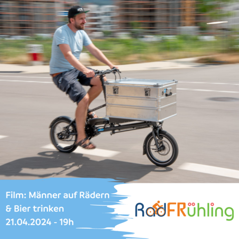 Mann fährt auf einem Lastenrad