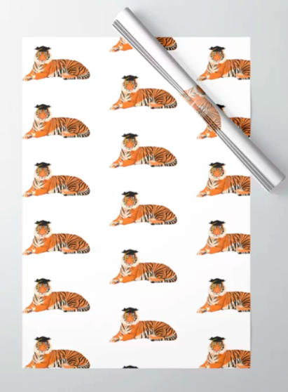 Our tiger mascot is graduating, holding a diploma and wearing a mortar board.