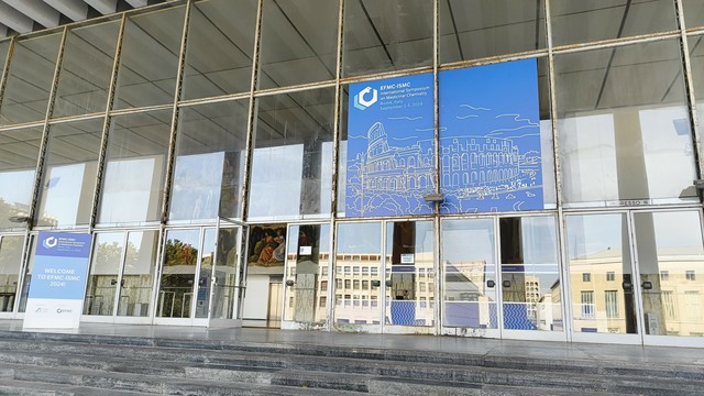 poster of the conference showing the title, place and the colosseum