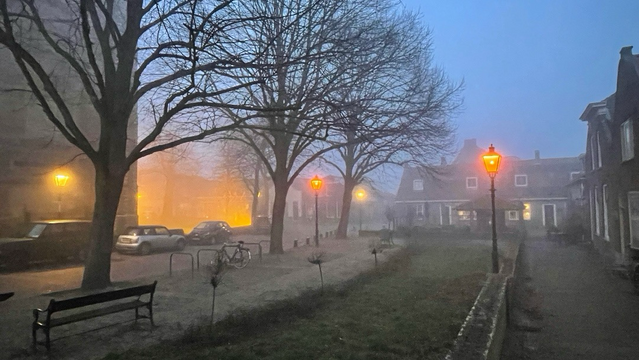 Misty morning in a village.