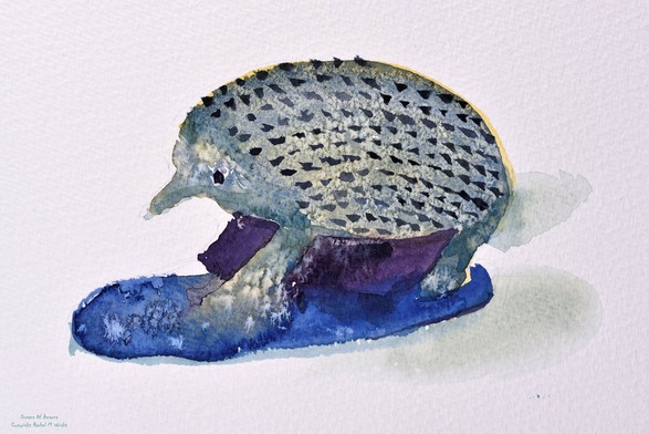 Smail faience hedgehog painted in watercolours. The first layer has some salt crystals used for a speckled effect.