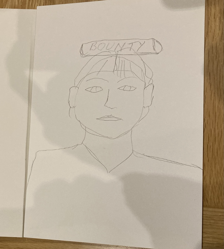 Pencil sketch of person with a chocolate bounty bar on their head.