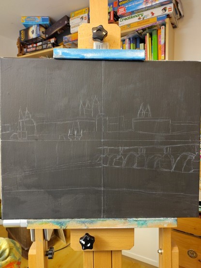Rough white pencil sketch on black canvas of Charles Bridge at night, in preparation for a painting.