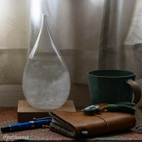 Storm glass, coffee, travelers notebook (
passport size) and fountain pen