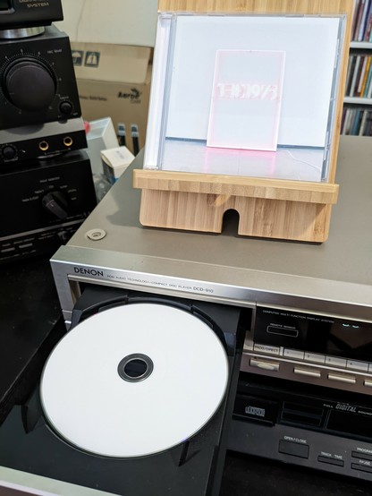 The album on display and the CD in the player.