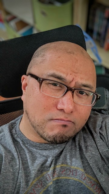 me, as cleanshaven as you're going to get, but eyes looking in a different direction.