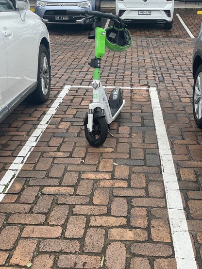 Abandoned Lime scooter parked illegally in car park pedestrian access way in St Lucia on eve of #TCAlfred.