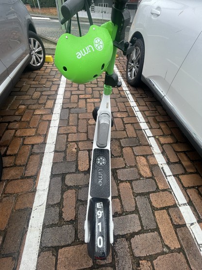 Abandoned Lime scooter parked illegally in car park pedestrian access way in St Lucia on eve of #TCAlfred.