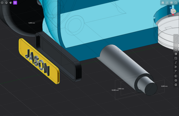 Exploded 3D model of a toy car axle and number plate showing how they will fit together after 3D printing
