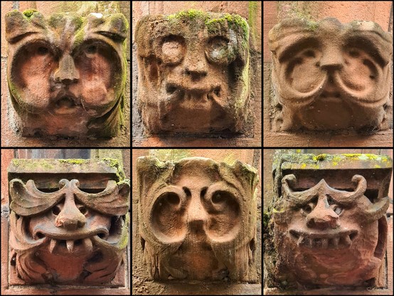 A series of weird and wonderful sculpted heads on a series of Glasgow tenements.