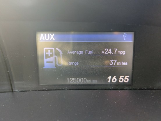 Info screen on a Honda Civic showing 125,000 miles on the odometer.