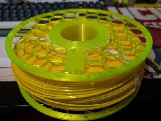 1 kilo roll on reusable spool.