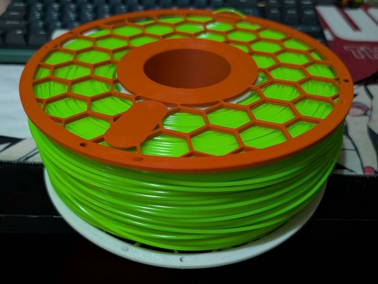 1.2 kilo roll on reusable spool.