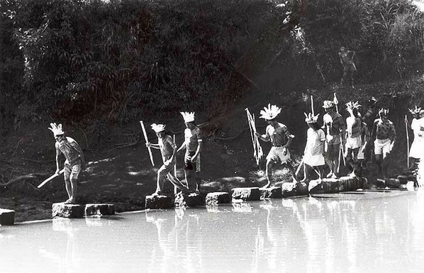 photo - historic - tribal members crossing a river, Southern Brazilian Highlands
