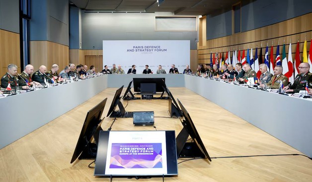French President Emmanuel Macron, French Defence Minister Sebastien Lecornu and Chief of Staff of the French Armed Forces (CEMA) Thierry Burkhard attend a meeting with the chiefs of staff of the European Union and NATO armies on the conflict in Ukraine at the Musee de la Marine as part of the Paris Defence and Strategy Forum in Paris, France, March 11, 2025. REUTERS/Sarah Meyssonnier/Pool