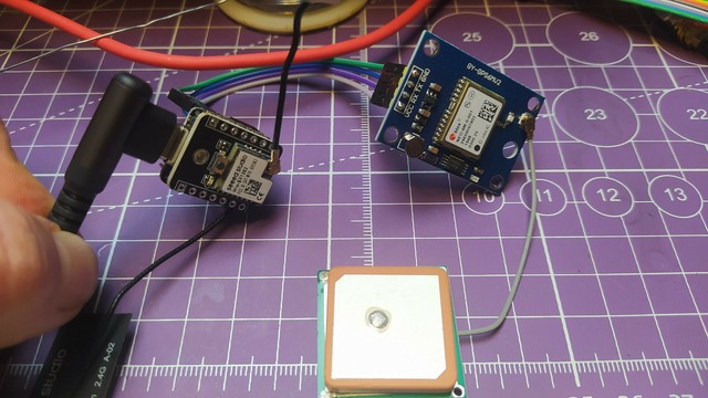 The tiny Xiao esp32 meshtastic device wired to a classic NEO6-M GPS device