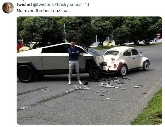 picture of a guy standing next to a Tesla wankpanzer with all its front turned into shards after smashing the rear end of a VW Beetle
