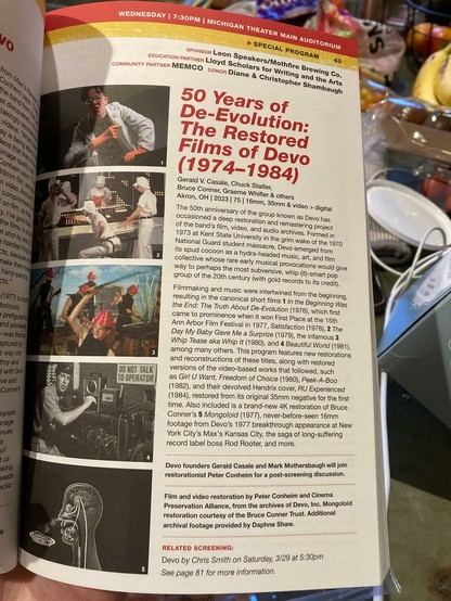 Photo of a printed page describing "50 Years of De-Evolution: The Restored Films of Devo (1974–1984)", an event tomorrow night at the Michigan Theater in Ann Arbor, Michigan featuring the two co-founders of the world's greatest failed art project, Devo.