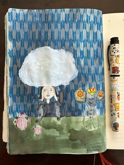Sketch in sketchbook of myself sitting at a table. My head is in a big white cloud. On the table are some organic flowers in a vase and a teapot and tea cup with a red/white striped pattern. On the wall is a wallpaper which resembles the Japanese pattern of feather