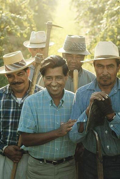 Historical photo of Cesar Chavez with farm workers