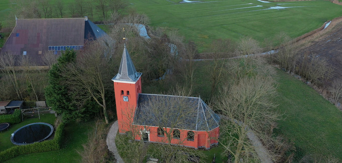 De Mariakerk van Boer in het (aan de zee onttrokken) weidse landschap
