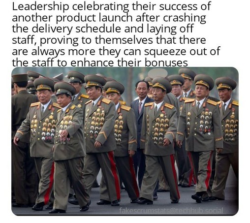 A group of overly medal-adorned North Korean generals waking ij a group.

Caption: Leadership celebrating their success of another product launch after crashing the delivery schedule and laying off staff, proving to themselves that there are always more they can squeeze out of the staff to enhance their bonuses