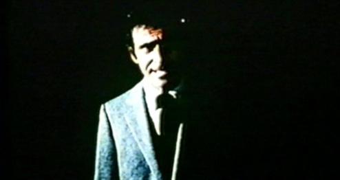 Rod Serling emerging from the darkness