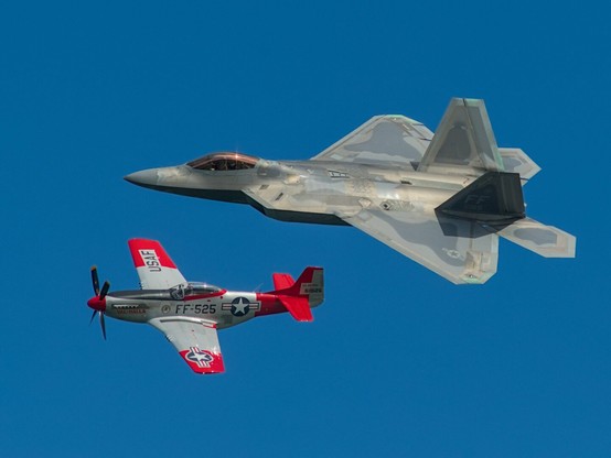 P-51 Mustang and a F-22 Raptor flying side by side for the heritage flight in San Francisco for the air show in 2024