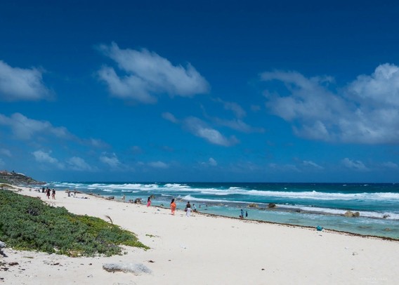 A bright, clear day at the beach at Chen Rio in Cozumel, Mexico.