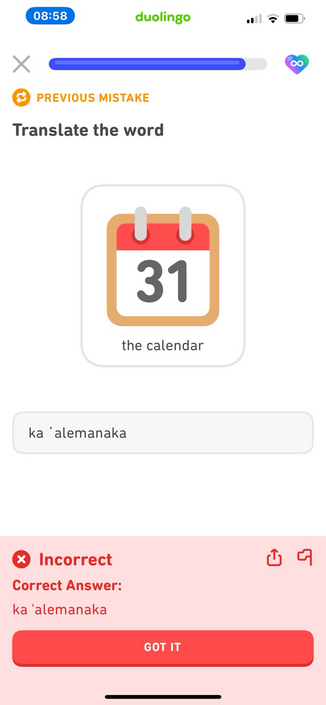 Screenshot of a Duolingo exercise with a cartoon page-a-day calendar, captioned in English “the calendar.“ Below is a text entry field and I have typed “ka ʻalemanaka” and at the bottom in red Duolingo has responded INCORRECT but shows the correct response as “ka ʻalemanaka”