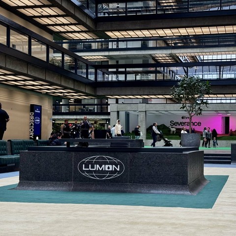The concierge desk at Bell Works, featuring Lumon branding.