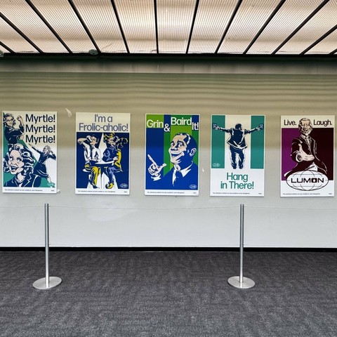 Inspirational posters inspired by Season 2 of Severance in the main Atrium of Bell Works.