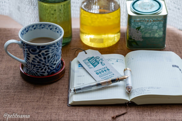 cup of coffee, elder flower flavored green tea, fountainpen, 5 year diary