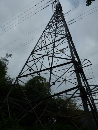 A photo titled "From the Stratford-on-Avon Canal - Brandwood Tunnel East End towpath exit - Electricity pylon", taken near Brandwood Tunnel East Portal by ell brown on Flickr.