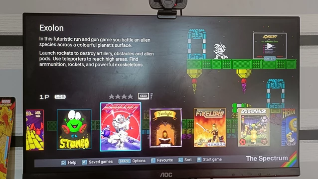 And here is a photo of my monitor with the console's "Carousel" screen, a menu depicting a horixontal gallery of the 48 games (I see what you did there) that are stored in the machine, titles including Skool Daze, Horace Goes Skiing, The Hobbit and Target Renegade. This is nostalgic joy right here. Oh, I've been emulating the speccy on PC since the 90s but it's still lovely to have a replica machine I can play on a TV!