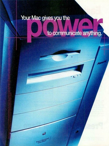 Advertisement for the Power Macintosh 9600/200MP computer. The ad features a close-up view of the computer tower bathed in blue lighting, emphasizing its sleek and powerful design. The main slogan reads, "Your Mac gives you the power to communicate anything," with the word "power" prominently highlighted in bold pink letters. The lower part of the image displays the iconic Apple logo and the model name "Power Macintosh 9600/200MP."