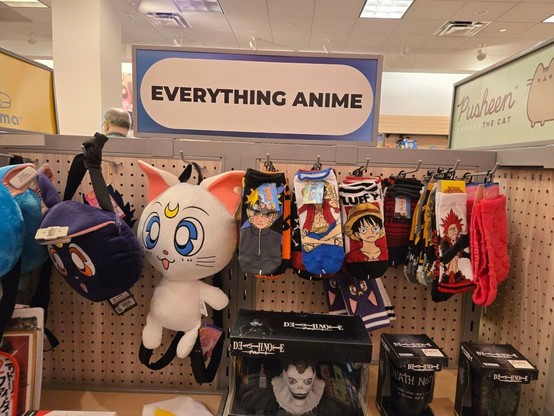 A display of anime merchandise from Sailor Moon Naruto One Piece Death Note and My Hero Academia