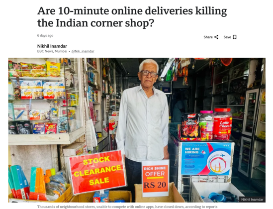 Are 10-minute online deliveries killing the Indian corner shop? An elderly gentleman standing in a small shop with "stock clearence sale" bord.