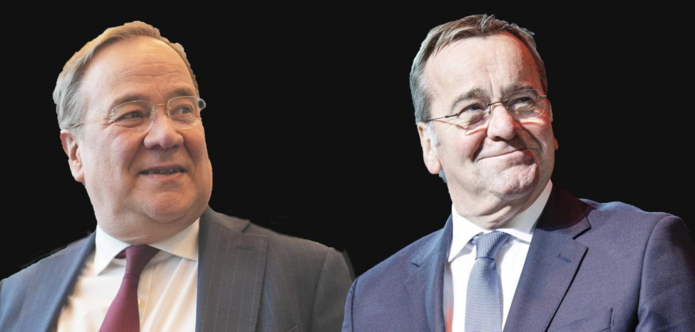 German politicians Laschet and Pistorius - Two white men around 60 with glasses and strikingly similar features.