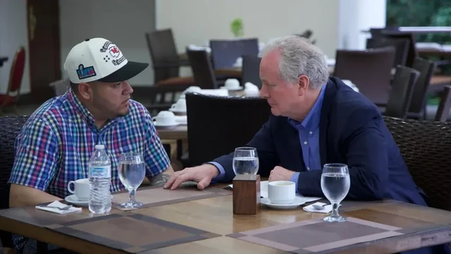 The original photo of the two men with only water & coffee.