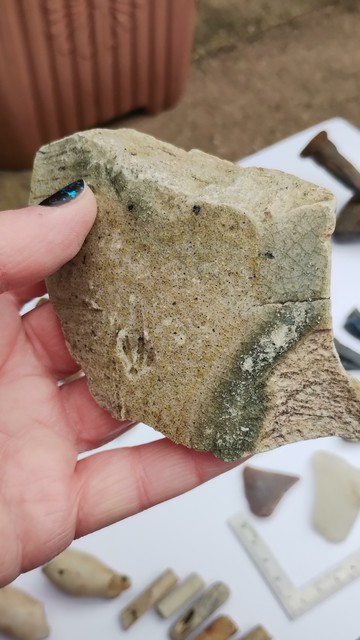 a chunk of possibly victorian pottery bed warmer bottle, or jug of some type.
