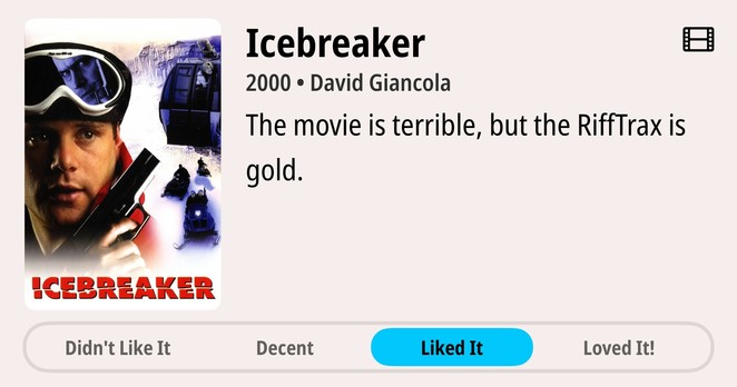 Review for the 2000 film "Icebreaker" directed by David Giancola. A person wearing ski goggles and a white helmet holds a gun in the foreground. The background shows snowy terrain with snowmobiles. The poster has a blue tint and features the film title "ICEBREAKER" in bold red letters at the bottom. Text at the top states "The movie is terrible, but the RiffTrax is gold." Rating buttons appear below: "Didn't Like It," "Decent," "Liked It" (highlighted), and "Loved It!"