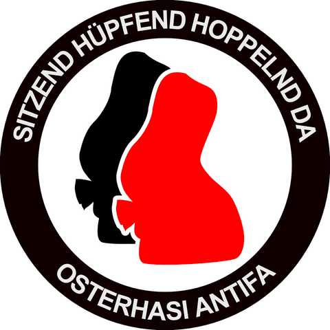 Antifasticker mit Osterhasen in schwarz und rot: "Sitzend hüpfend hoppelnd da Osterhasi Antifa"